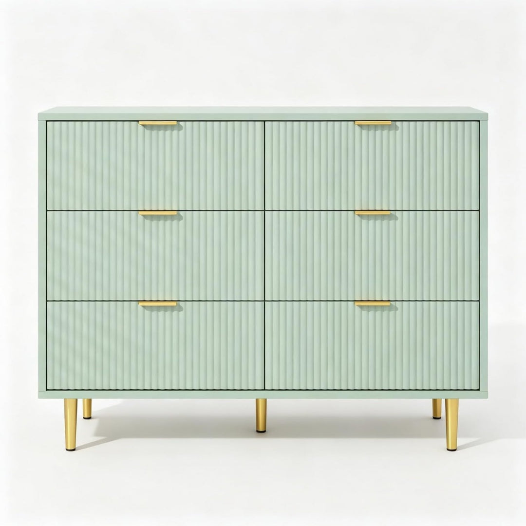 Beschichtete Flaechen praegen das Sideboard in Gruen